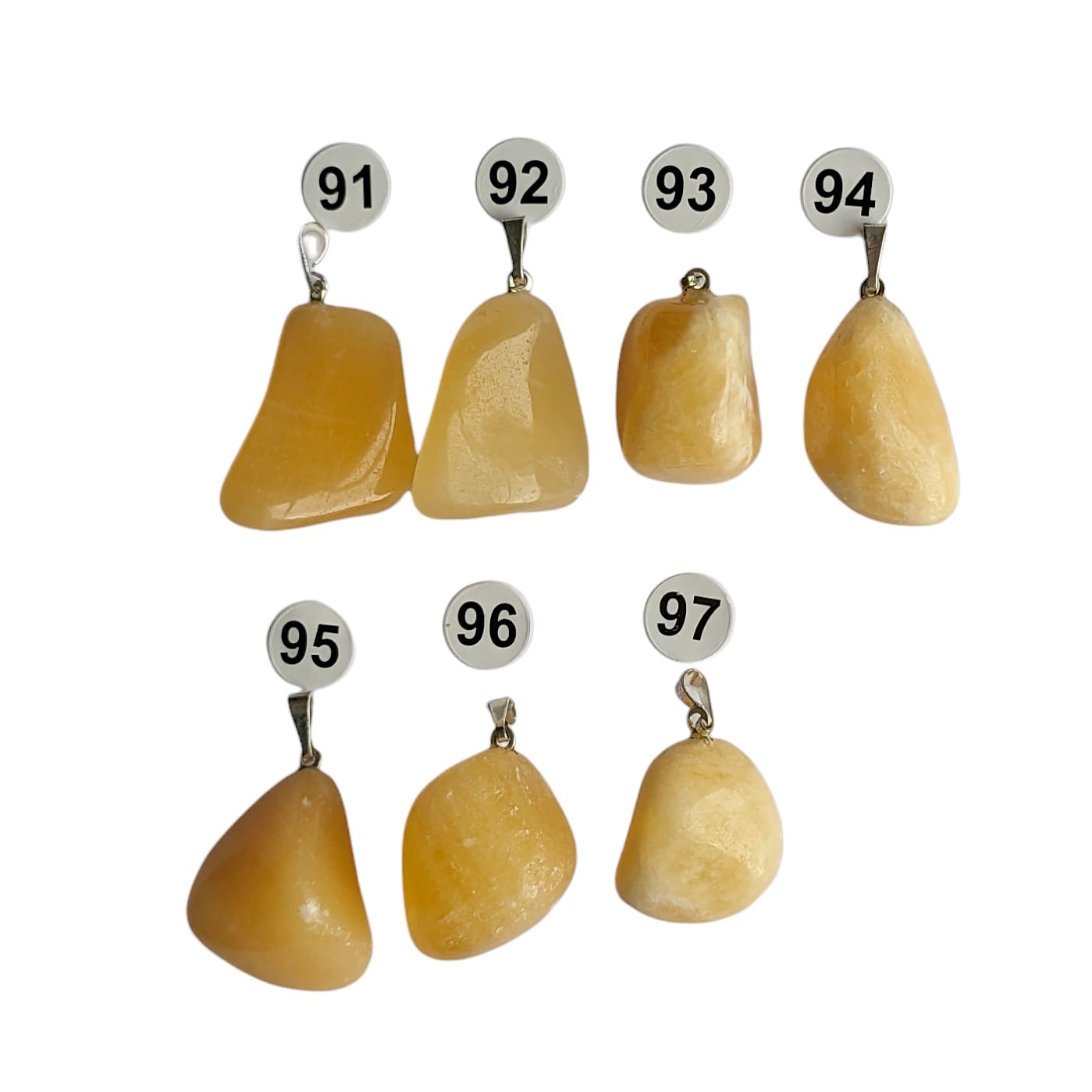 Pendentif en Calcite Orange Roulée – Énergie et Joie de Vivre