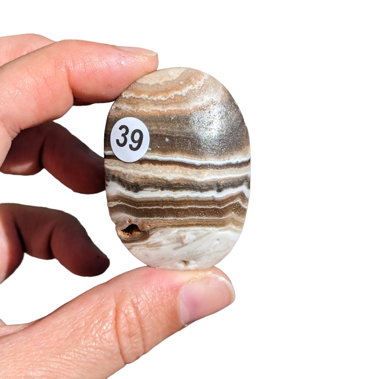 Galet Calcite Zébrée – Énergie et Stabilité