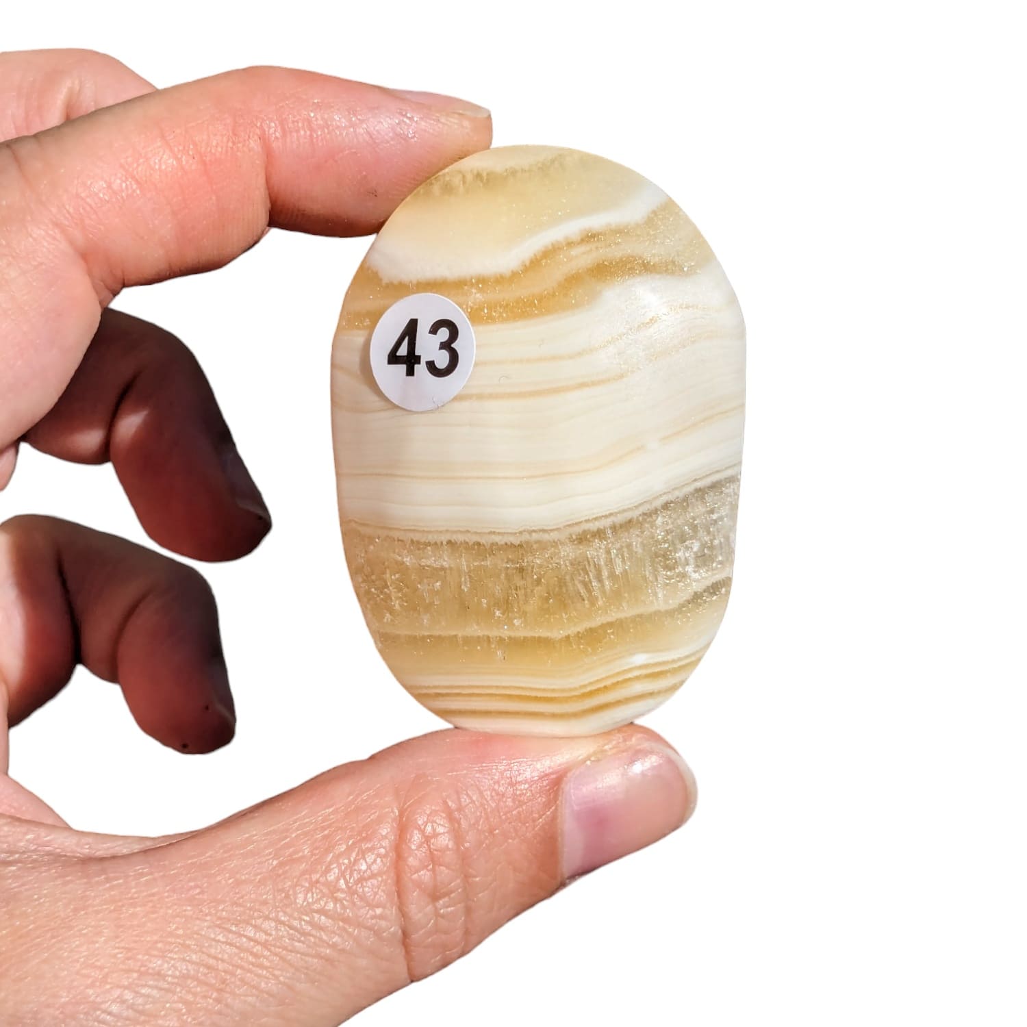 Galet Calcite Zébrée – Énergie et Stabilité