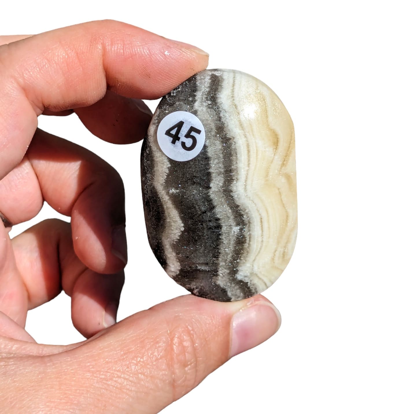 Galet Calcite Zébrée – Énergie et Stabilité