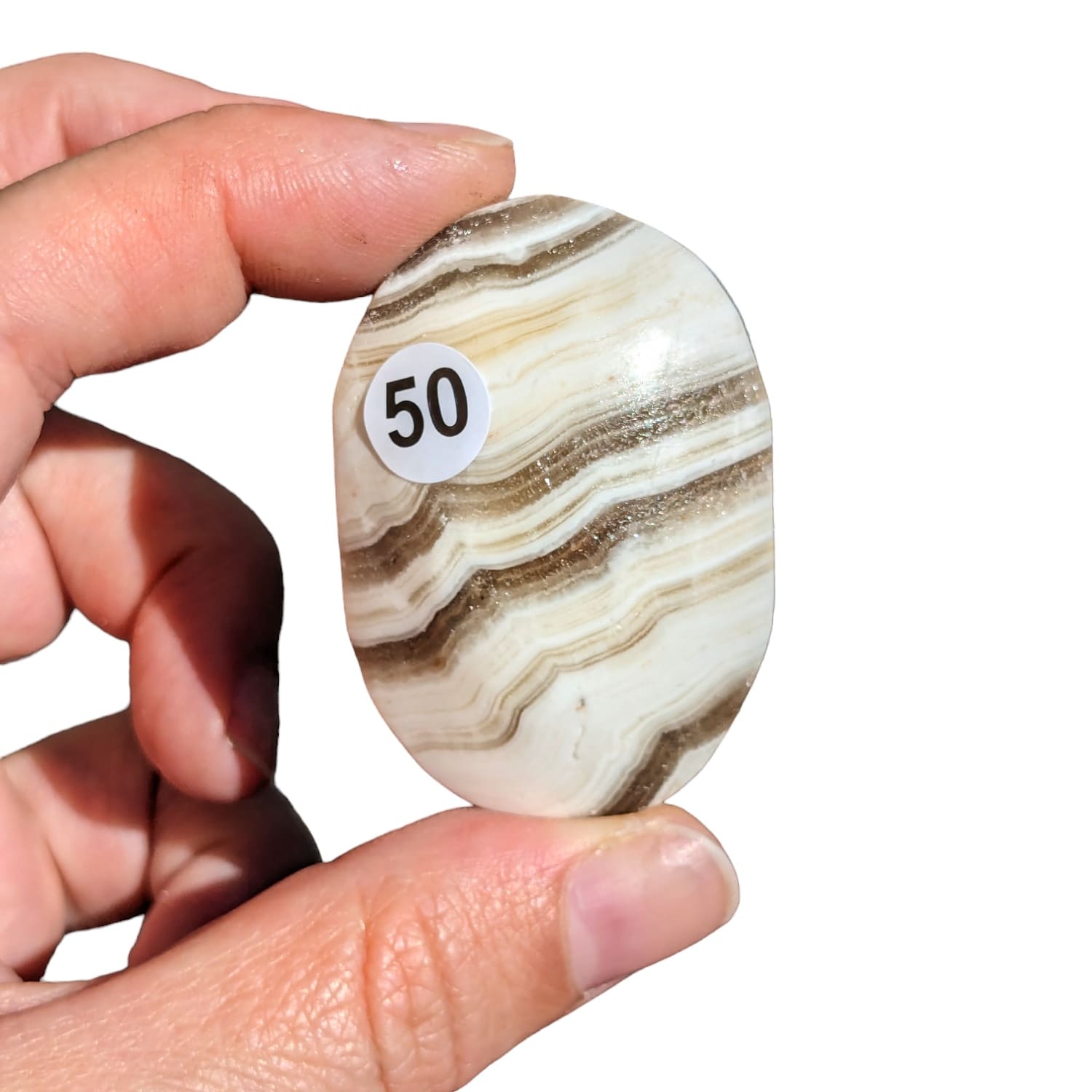 Galet Calcite Zébrée – Énergie et Stabilité