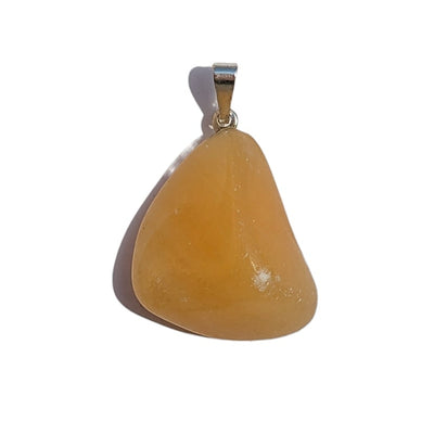 Pendentif en Calcite Orange Roulée – Énergie et Joie de Vivre