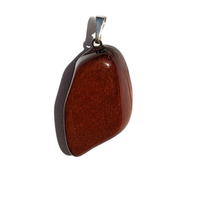 Pendentif en Œil de Taureau Roulée – Force et Protection