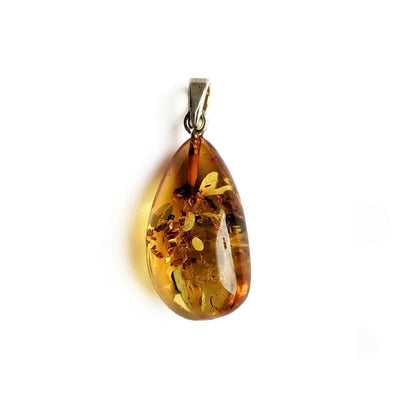Pendentif en Ambre – Chaleur et Protection Naturelle